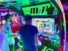 Mission: Impossible Arcade - Two players concentrating on the game